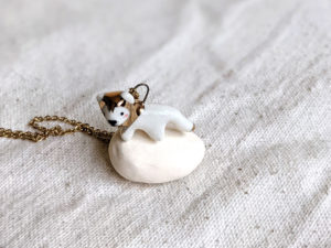 porcelain gold lion pendant