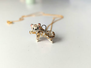 porcelain pendant snow leopard tail