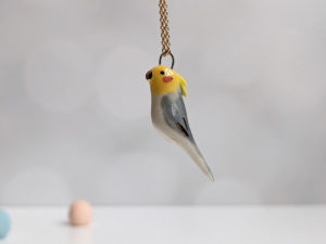 pendentif calopsitte porcelaine or